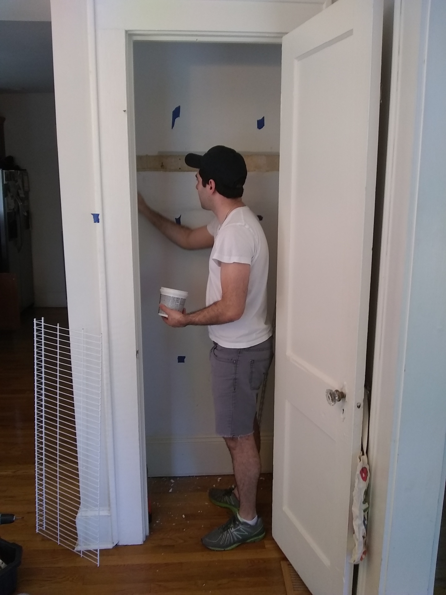 Atlanta Pro Repairs — custom closet shelving install with painted interior and shelf-pin spacing
